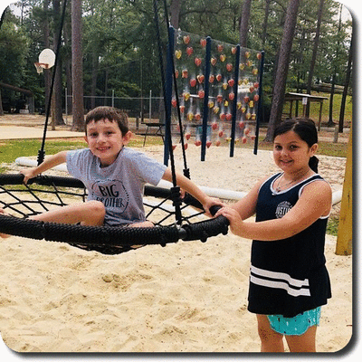 tanner and lilly on swing